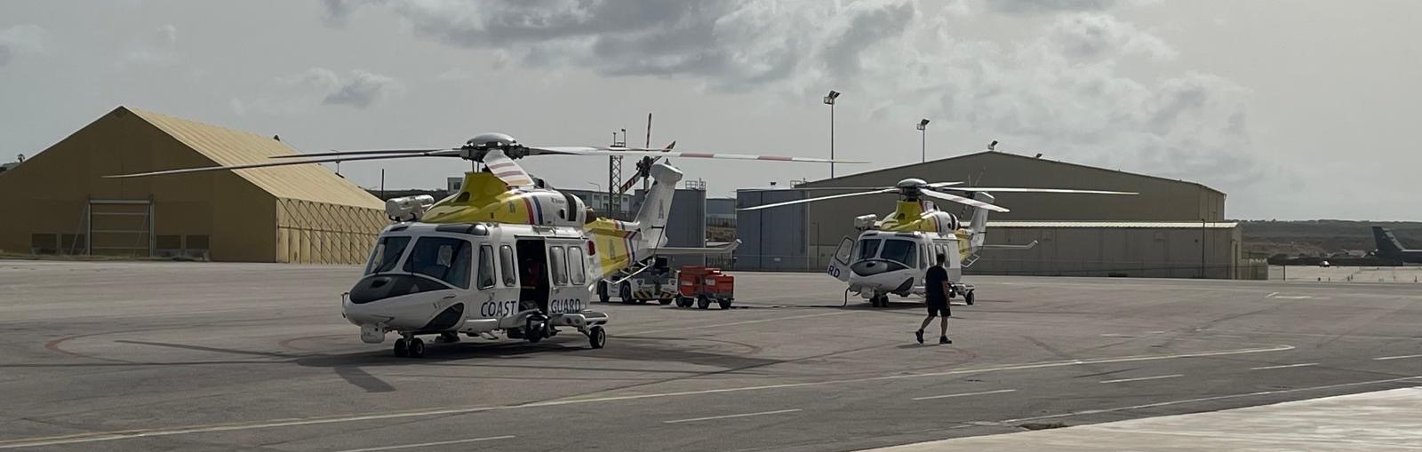 Two helicopters on the flightline